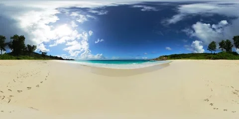 Idyllic beach with soft sand and ocean waves. La Digue, Seychelles. Stock Footage 302772860