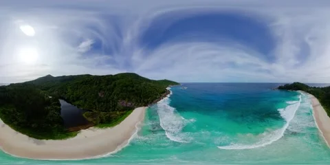 Idyllic beach with turquoise waves and forested hills. Mahe, Seychelles. Stock Footage 311216356
