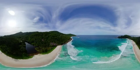 Idyllic beach with turquoise waves and forested hills. Mahe, Seychelles. Stock Footage 346872963