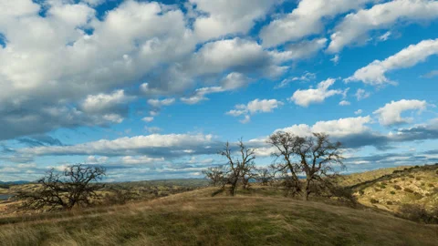 Idyllic Clouds Float above Spring Sierra Nevada Landscape Stock Footage 282962493