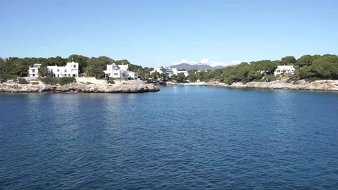 Idyllic coast view of Cala DOr Majorca island, Mediterranean Sea Coast Spain Stock Footage 100682568