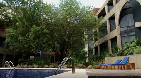 Idyllic hotel pool Stock Footage 21929745