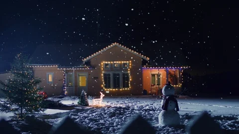 Idyllic House Decorated with Lights and Garlands for Christmas Eve.  Stock Footage