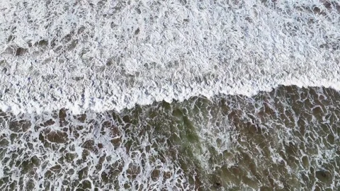 Idyllic ocean scene with foamy beach surf, natural seascape background Stock Footage 310529681
