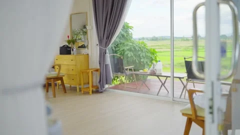 Idyllic open plan kitchen and casual living in a cottage Stock Footage 313342356