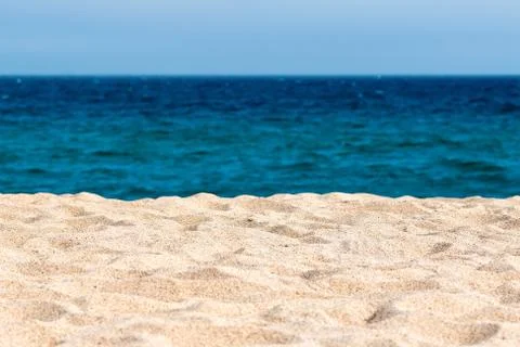Idyllic sand beach background. Stock Photos