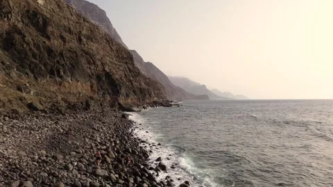 Idyllic scene of a couple walking at unspoiled virgin beach in Gran Canaria 스톡 동영상 280197152