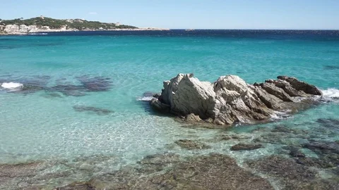 Idyllic sea view at seaside on Majorca beach with soft waves at coast Stock Footage 100681947
