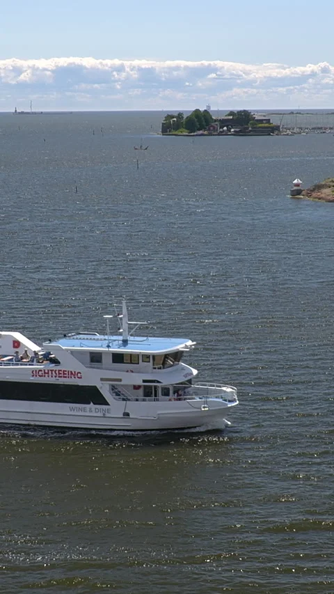 Idyllic shot of a boat sailing between the coastal islands near Helsinki. Stock Footage 340435876