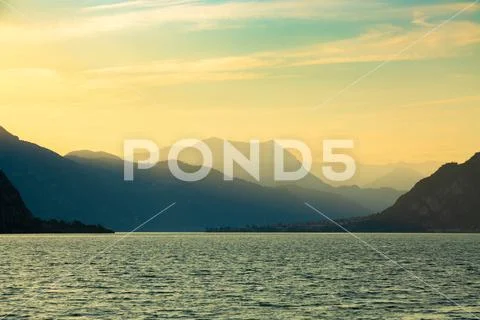 Idyllic sunset over Lake Como next to Lecco city, Lombardy, Italy Stock Photos