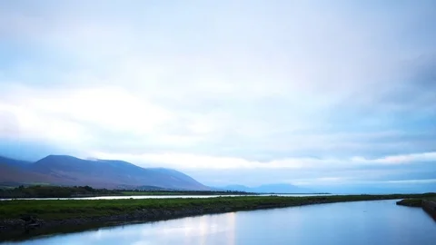 Idyllic Timelapse Shot Of Clouds Rolling Over Mountain And Lake Stock Footage 70797115