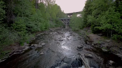 Idyllic view of rapids with 2 bridges Stock Footage 152505965