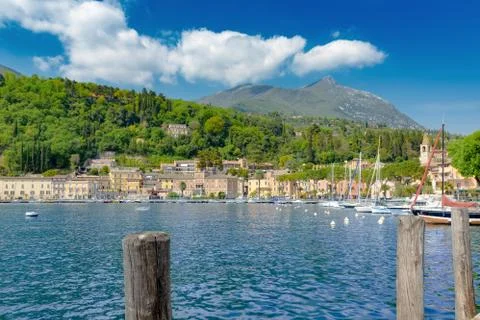 An idyllic view of the small town from a small harbor on the jetty by the lak Stock Photos