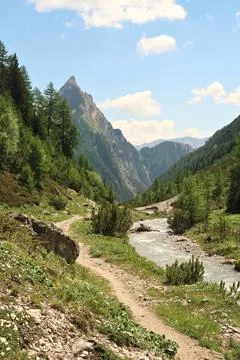Idyllic view while walking on the trail along the Hhenbach river, stream, c.. Stock Photos
