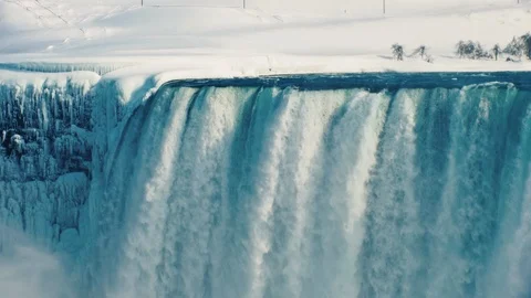 Idyllic view of the winter Niagara Falls. The earth is covered with pure snow Stock Footage 86898906