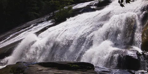 Idyllic waterfall gushing over the rocks in slow motion Stock Footage 103819724