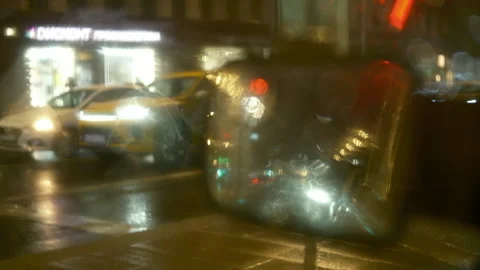 Iew from wet window inside in car, defocused traffic jam Video stock 310995611