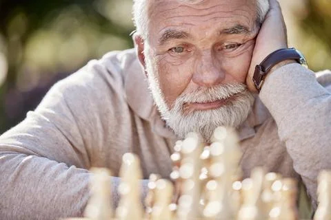 If this is a game why is draining my brain. Shot of a senior man playing a game 스톡 사진