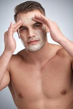 If it burns, youre doing it wrong. Studio portrait of an attractive young man Stock Photos