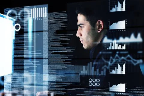 If its online, hell find it. Shot of a young hacker cracking a computer code in Stock Photos