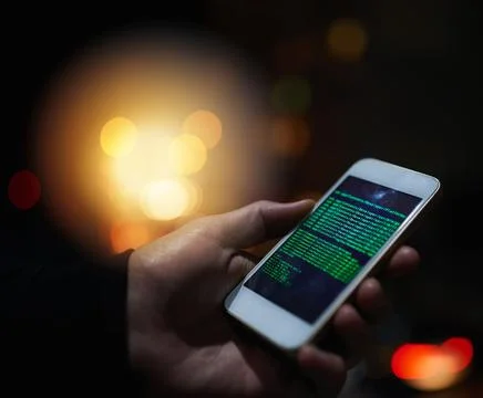 If its online, its hackable. an unidentifiable computer hacker using a 库存照片