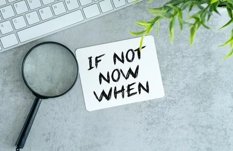 If Not Now When, text on a stack of note paper. Motivating and inspiring qu.. Stock Photos