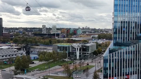 IFS Cloud Cable Car Low Angle View of Greenwich Peninsula Terminal Building Stock Footage 320111427