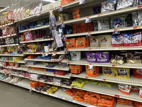IGA grocery store candy section and prices Stock Photos