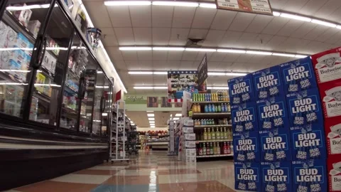 IGA retail grocery store workers and customers wearing face masks Stock Footage 158289374