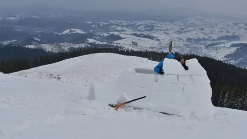 Igloo building video Stock Footage 82036817