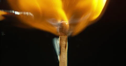 Ignite, fire and burning match on black background for heat, light and lighting Stock Footage 253701099