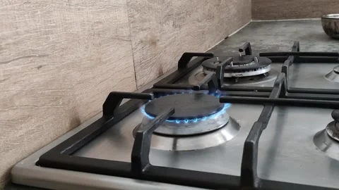 Ignite stove burner close up Stock Footage 164871444