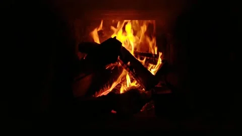Ignited fireplace in the apartment Stock Footage 212999632