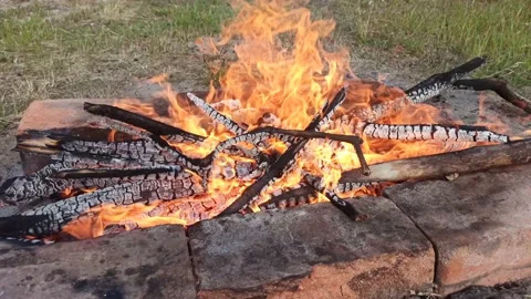 Igniting fire for cooking meat and ribs. Stock Footage 132120342