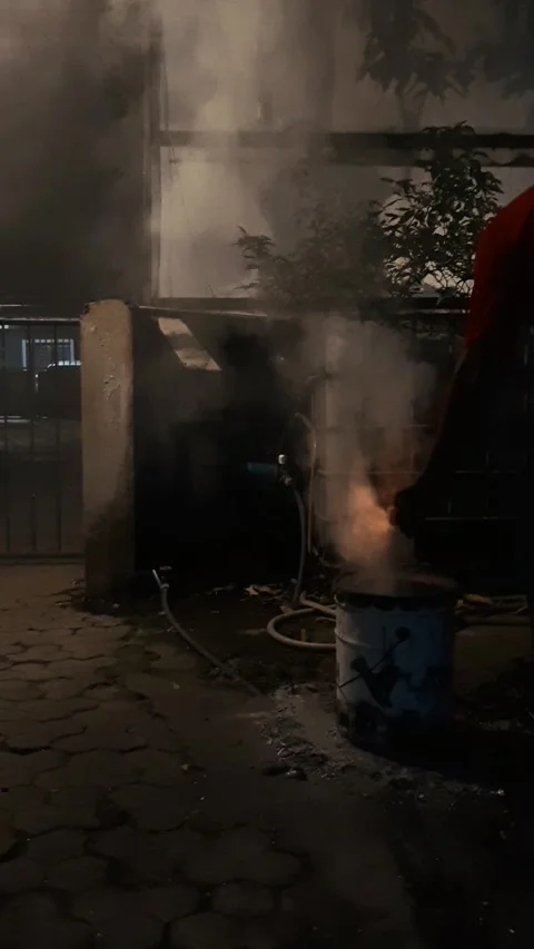 Igniting Fire inside Barrel, Vertical Footage Video stock 340110080