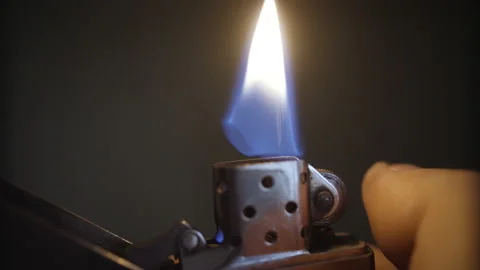 Igniting a gasoline lighter close-up Stock-Footage 153117257