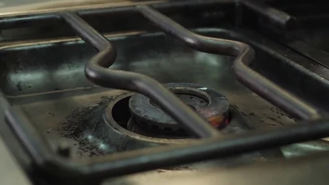 Igniting the restaurant stove Stock Footage 76851831