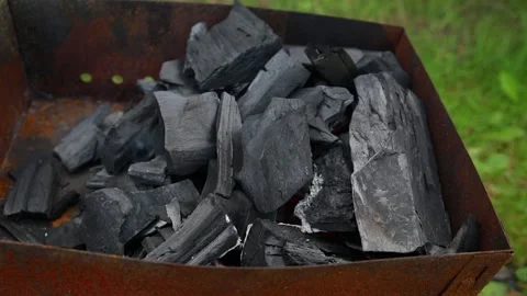 Ignition of charcoal in the grill. Stock Footage 137587179