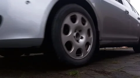Ignition click and engine crank as car pulls away in low rumble with headlights  Stock Footage 341317951