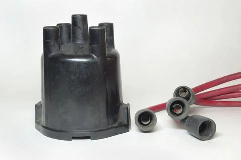 Ignition distributor cap front side. set of high tension cables, rubber boo.. Stock Photos