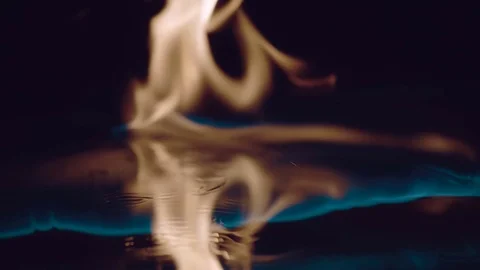 Ignition of gasoline with an electric lighter in slow motion Stock Footage