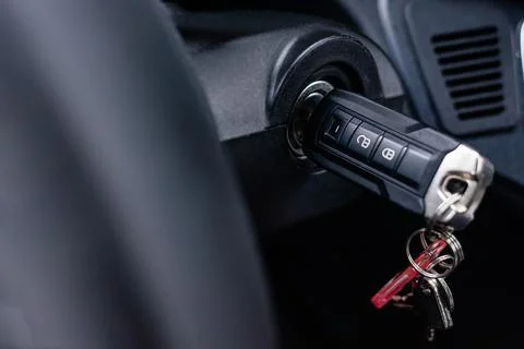 Ignition key inserted into steering column of commercial vehicle Stock Photos