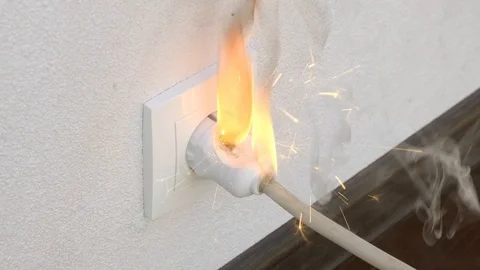 Ignition of outlet during short circuit in apartment. Video stock 114582398