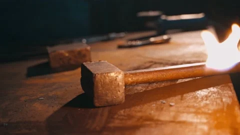 Ignition of an oxygen burner on the background of a table with tools Stock Footage 231183884