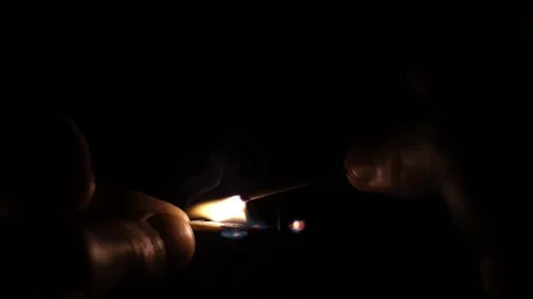 Ignition of second match in the dark Stock Footage 156856077