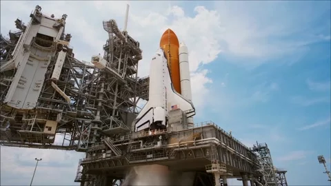 Ignition of the Space Shuttle engines on the launch pad. 4K Stock Footage 310351968