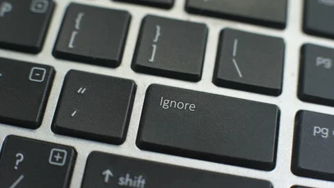 Ignore button on computer keyboard, female hand fingers press key Stock Footage 97828462