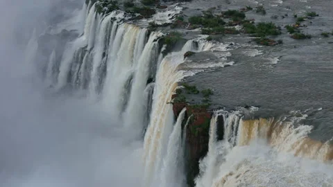 Iguazu Falls powerful waterfall cascades with dramatic mist and rock formations Stock Footage 311234907