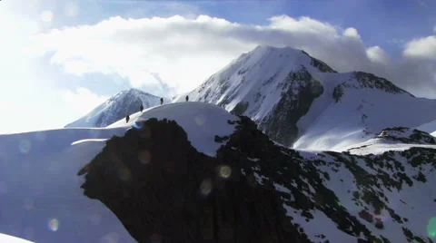 Iiktoo mountain, South Chui range, altitude 4000 m. Climber rises on a steep mou 스톡 동영상 61225832