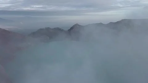 Ijen, Java, Indonesia - May 22, 2025 Aerial view of turquoise crater lake Stock-Footage 345740474